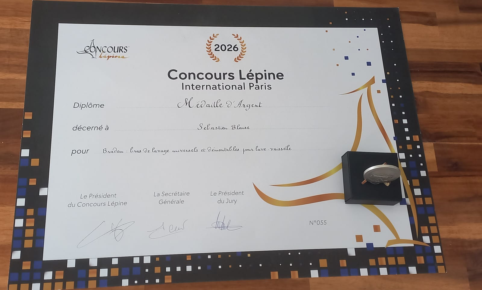 Diplôme n°055 « Médaille d'Argent » du Concours Lépine 2026 décerné à Sébastien Blaise pour Bradem, avec la médaille dans son écrin